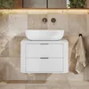 A modern bathroom vanity with a vessel sink and a towel hanging on the wall. Produktbild-Vorschau
