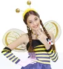 A young girl wearing a bee costume, smiling and posing. Produktbild-Vorschau