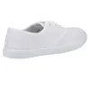 A side view of a white canvas sneaker. Produktbild-Vorschau