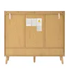The back view of a wooden cabinet with labels and hanging hardware. Voir les images du produit