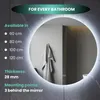 A round mirror with LED lighting in a bathroom setting. Anteprima dell’immagine prodotto