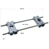 A product shot of a metal clamp assembly with dimensions indicated by red lines and text. Voir les images du produit
