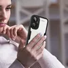 A woman is holding and looking at a smartphone with a black and white case. Produktbild-Vorschau