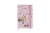 A Moleskine notebook with a pink cover featuring a whimsical illustration of people and a dog in a park setting. Produktbild-Vorschau