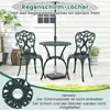 A green bistro set with two chairs and a table, with an umbrella and base. A close-up of a decorative element is shown in the bottom left. Náhľad obrázku produktu