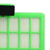 Close-up of a green vacuum cleaner filter with white filter material. Produktbild-Vorschau
