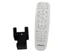 A white remote control and a black remote control holder are displayed against a white background. Produktbild-Vorschau
