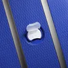 A close-up view of a blue suitcase with a luggage tag. Anteprima dell’immagine prodotto