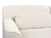 Close-up of a white bouclé sofa with a bolster pillow. Podgląd zdjęcia produktu