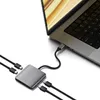 A Satechi USB-C hub is connected to a laptop, with multiple USB-C cables extending from the hub. Produktbild-Vorschau