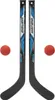 Two hockey sticks and two balls on a white background. Podgląd zdjęcia produktu