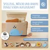 A storage box with a whale design is shown filled with items, with text overlays describing its features and options. Produktbild-Vorschau