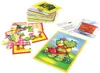 A children's puzzle game with a dragon character and various puzzle pieces and cards. Náhled obrázku produktu
