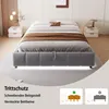 A modern bedroom with a grey upholstered bed frame, bedside tables, and decorative lighting. Náhled obrázku produktu