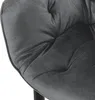 A close-up view of the tufted velvet upholstery of a chair. Produktbild-Vorschau