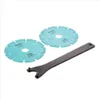 Two turquoise cutting discs and a black wrench are arranged on a white background. Podgląd zdjęcia produktu