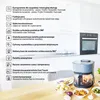A countertop shot of a multi-functional air fryer with various food items in bowls around it, set against a kitchen background with cabinets and an oven. Podgląd zdjęcia produktu