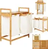 Multiple views of a bamboo laundry basket with two fabric bags and a shelf. Anteprima dell’immagine prodotto