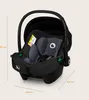 A black and gray baby car seat is shown against a light beige background, with dimensions indicated by lines and text. Anteprima dell’immagine prodotto