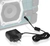 A close-up shot of a power adapter and a cable plugged into a speaker. Anteprima dell’immagine prodotto