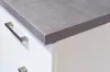 A close-up view of a kitchen cabinet countertop and drawer fronts. Náhled obrázku produktu