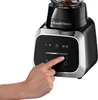 Close-up of a hand interacting with the control panel of a blender. Produktbild-Vorschau