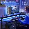 A person is using a gaming desk with dual monitors, RGB lighting, and accessories. Anteprima dell’immagine prodotto