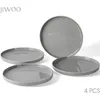 A set of four gray ceramic plates on a white background. Produktbild-Vorschau