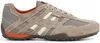 A side view of a single beige Geox sneaker against a white background. Produktbild-Vorschau