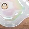 A close-up view of a pearlescent sink with a drain. Náhľad obrázku produktu