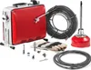 A collection of plumbing tools, including a drain cleaning machine, cables, and accessories, laid out on a white background. Anteprima dell’immagine prodotto