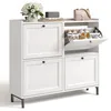 A white shoe cabinet with multiple compartments and a flap-open shoe storage section, displayed against a white background. Náhľad obrázku produktu