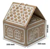A cardboard gift box shaped like a gingerbread house, decorated with white icing patterns. Podgląd zdjęcia produktu