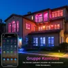 A house illuminated with colorful LED lights controlled by a smartphone app. Produktbild-Vorschau