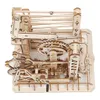 A wooden mechanical model of a marble run. Voir les images du produit