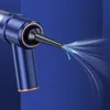 A close-up shot of a blue handheld vacuum cleaner nozzle emitting a stream of air, with blue arrows indicating airflow direction. Náhled obrázku produktu