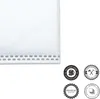 A close-up of a white vacuum cleaner bag with stitching and several circular badges with text and icons. Produktbild-Vorschau