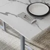 A close-up shot of a dining table set for a meal. Anteprima dell’immagine prodotto