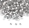A pile of small, clear rhinestones on a white background. Náhľad obrázku produktu