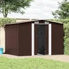 A brown metal shed is shown in a backyard setting with grass and a wooden walkway. Podgląd zdjęcia produktu