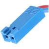 A close-up of a blue electrical connector with red and blue wires attached. Podgląd zdjęcia produktu