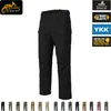 A product image for tactical pants, showing the main product and various color swatches, along with brand logos and feature callouts. Produktbild-Vorschau