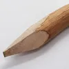 A close-up shot of the sharpened end of a wooden stake. Produktbild-Vorschau