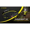 A person is running in a forest at night with a headlamp, and a product image of a Nitecore battery pack is shown. Produktbild-Vorschau