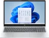 A silver HP laptop is shown from a front-facing diagonal angle, open with the screen displaying the Windows 11 settings menu. Voir les images du produit