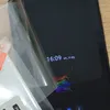 A close-up shot of a phone screen protector being applied to a smartphone. Produktbild-Vorschau