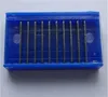 A set of replacement blades for a pencil sharpener, housed in a blue plastic case. Produktbild-Vorschau
