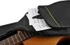 Close-up view of a guitar case with sheet music and a capo inside. Náhľad obrázku produktu