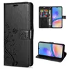 A collage of images showing a black leather wallet-style phone case with a floral embossed design, and a smartphone inside the case. Produktbild-Vorschau