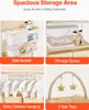 Collage of four images showcasing features of a baby changing table. Anteprima dell’immagine prodotto